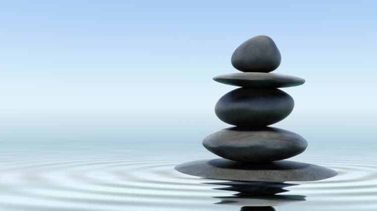 Stack of zen stones in water